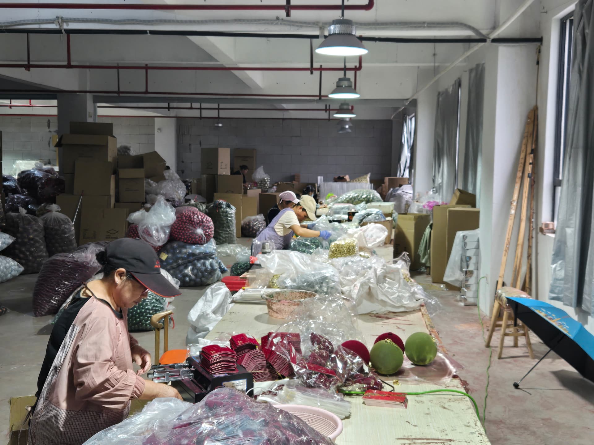 Christmas ornament factory workers at assembly and packing stations for social compliance audit review — Christmas Ornament Supplier vs Trading Company: Which Is Better for Wholesale Buyers?