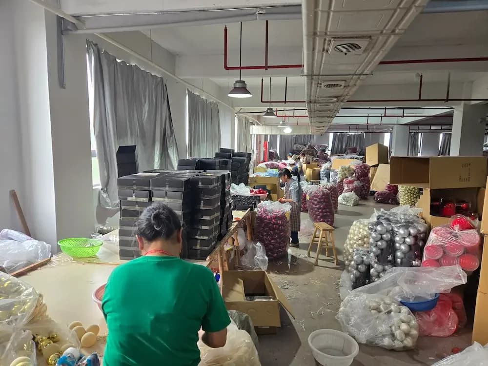 Fillable Christmas ball cap assembly and seal testing on a factory line